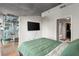 Open layout from bedroom to living area, with a view to a stylish bathroom at 250 Pharr Ne Rd # 607, Atlanta, GA 30305