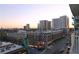 Enjoy a beautiful sunset view of the Atlanta skyline and street from this unit's balcony at 250 Pharr Ne Rd # 607, Atlanta, GA 30305