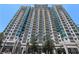 High-rise building with full view of the entrance and landscaping at 250 Pharr Ne Rd # 607, Atlanta, GA 30305