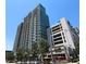 Luxury highrise building with a parking garage and street level retail at 250 Pharr Ne Rd # 607, Atlanta, GA 30305