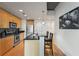 Well-equipped kitchen with stainless steel appliances, granite counters, and breakfast bar seating at 250 Pharr Ne Rd # 607, Atlanta, GA 30305