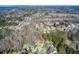A high angle view of a quiet neighborhood on a clear day in a wooded area at 322 Berkshire Trce, Canton, GA 30115