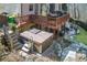 Backyard hot tub, deck, and firepit are perfect for outdoor entertaining at 322 Berkshire Trce, Canton, GA 30115