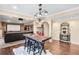 Finished basement area features a large screen, seating, custom table, and unique decor at 322 Berkshire Trce, Canton, GA 30115