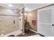 Bathroom boasts a unique barrel sink, tiled shower and upgraded lighting at 322 Berkshire Trce, Canton, GA 30115