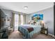 Comfortable bedroom with accent furniture, natural light, and sea turtle artwork at 322 Berkshire Trce, Canton, GA 30115