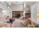Spacious living room with fireplace, built-in shelves, and soaring ceilings at 322 Berkshire Trce, Canton, GA 30115