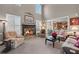 Inviting living room featuring a stone fireplace and abundant natural light at 322 Berkshire Trce, Canton, GA 30115