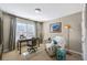Cozy home office with desk, chair, accent chair, and natural light from a large window at 322 Berkshire Trce, Canton, GA 30115