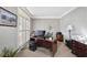 Bright home office with plantation shutters and custom built-in shelving at 322 Berkshire Trce, Canton, GA 30115