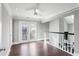 Bright bonus room with hardwood floors and French doors leading to a balcony at 409 Angier Ne Ct, Atlanta, GA 30312