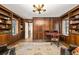 Spacious library with built-in bookshelves and a charming chandelier at 1790 Garraux Nw Rd, Atlanta, GA 30327