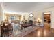 Elegant living room with hardwood floors, fireplace, and large windows at 1790 Garraux Nw Rd, Atlanta, GA 30327