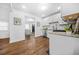Bright kitchen with granite countertops and stainless steel appliances adjacent to the open living space at 1092 Donnelly Sw Ave, Atlanta, GA 30310