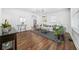 Bright living room with hardwood floors, comfortable sofa, and stylish decor at 1092 Donnelly Sw Ave, Atlanta, GA 30310