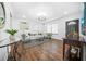 Spacious living room featuring hardwood floors, a neutral color palette, and ample natural light at 1092 Donnelly Sw Ave, Atlanta, GA 30310