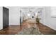 Cozy living room with hardwood floors offering natural light and comfortable seating adjacent to the bedroom at 1092 Donnelly Sw Ave, Atlanta, GA 30310