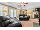 Spacious basement recreation room with fireplace and wet bar at 1731 Panorama Dr, Locust Grove, GA 30248
