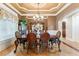 Formal dining room with hardwood floors and a chandelier at 1731 Panorama Dr, Locust Grove, GA 30248