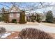 Brick house with a large front yard and driveway at 1731 Panorama Dr, Locust Grove, GA 30248