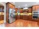Modern kitchen with stainless steel appliances and custom cabinetry at 1731 Panorama Dr, Locust Grove, GA 30248