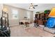 Home office with built in shelving, treadmill and comfortable seating at 1731 Panorama Dr, Locust Grove, GA 30248
