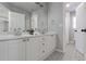 Bathroom boasts double vanity and patterned tile floors at 1747 Tappahannock Trl, Marietta, GA 30062