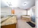 Primary bathroom with granite double vanity and a soaking tub at 540 Flint Ridge Ct, Jonesboro, GA 30238