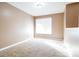 Simple bedroom with carpet and a window at 540 Flint Ridge Ct, Jonesboro, GA 30238