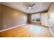 Spacious bedroom with hardwood floors and a ceiling fan at 540 Flint Ridge Ct, Jonesboro, GA 30238