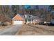 Brick ranch house with attached garage and porch at 540 Flint Ridge Ct, Jonesboro, GA 30238