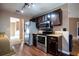 Galley kitchen with stainless steel appliances and granite countertops at 540 Flint Ridge Ct, Jonesboro, GA 30238
