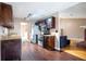 Kitchen with dark wood cabinets and granite countertops at 540 Flint Ridge Ct, Jonesboro, GA 30238