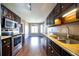 Eat-in kitchen with stainless steel appliances and granite counters at 540 Flint Ridge Ct, Jonesboro, GA 30238