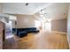 Open living room with vaulted ceiling and hardwood floors at 540 Flint Ridge Ct, Jonesboro, GA 30238