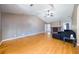 Spacious living room with hardwood floors and fireplace at 540 Flint Ridge Ct, Jonesboro, GA 30238