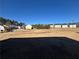 View of backyard and neighboring houses at 6403 Walnut Way, Union City, GA 30291