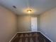 Simple bedroom with carpet flooring and neutral walls at 6403 Walnut Way, Union City, GA 30291