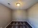 Simple bedroom with carpet flooring and neutral walls at 6403 Walnut Way, Union City, GA 30291