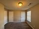 Spacious bedroom with two closets and neutral walls at 6403 Walnut Way, Union City, GA 30291