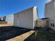 Tan vinyl sided house with covered patio at 6403 Walnut Way, Union City, GA 30291