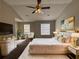 Large main bedroom with plush carpet and plenty of natural light at 6403 Walnut Way, Union City, GA 30291