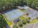 Aerial view of community amenities including pool, tennis courts, and playground at 2505 Ridgehurst Dr, Buford, GA 30518