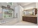 Bathroom with double vanity and garden tub at 2505 Ridgehurst Dr, Buford, GA 30518