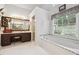 Spacious bathroom with double vanity, soaking tub, and shower at 2505 Ridgehurst Dr, Buford, GA 30518