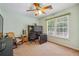 Bedroom with desk and rocking chair, carpeted floors at 2505 Ridgehurst Dr, Buford, GA 30518