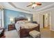 Spacious main bedroom with king bed and en-suite bathroom access at 2505 Ridgehurst Dr, Buford, GA 30518