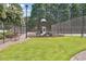 Community playground next to tennis courts at 2505 Ridgehurst Dr, Buford, GA 30518