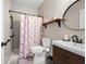 Bathroom featuring a vanity with a dark wood finish and a shower with a floral curtain at 42 Millstone Gln, Dallas, GA 30157