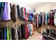Walk-in closet featuring shelving and hanging racks for clothing storage at 42 Millstone Gln, Dallas, GA 30157